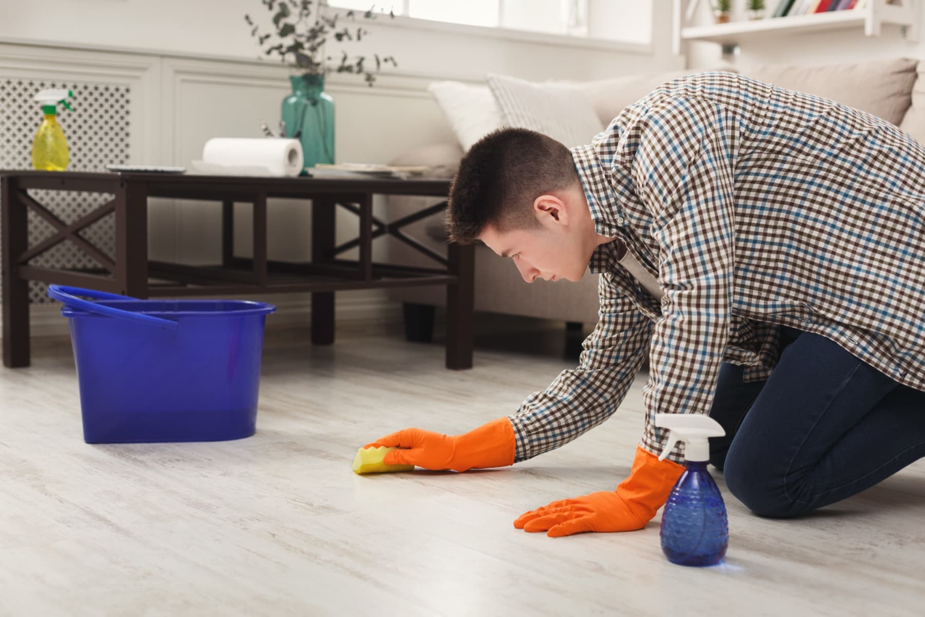 Cleaner scrubbing a hard floor