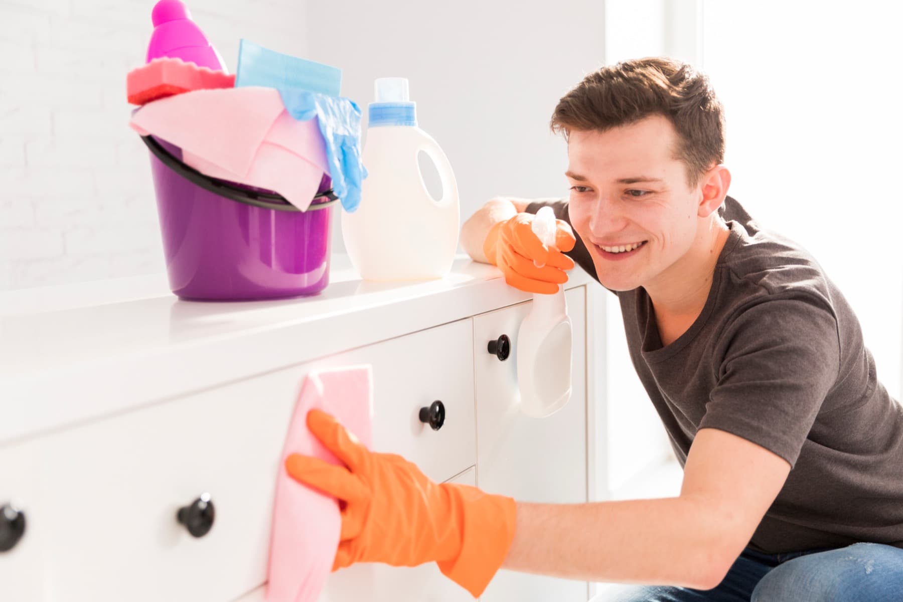 Primeway Property Services cleaner wiping down a surface